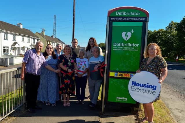 Group pictured at the official launch of a Defibrillator in the old telephone box at Maydown housing yesterday morning . From left are Lawrence Richmond, resident, Linda Sharkey, Enagh Youth Forum, Colr Gus Hastings, secretary of Strathfoyle Community Association, Mayor Sandra Duffy, Paul Hughes, Enagh Youth Forum, Lorraine McCartney, Maydown Community Association, Colr Racheal Ferguson, Martin McCartney,  chair of Maydown Community Association and Louise Doherty, Enagh Youth Forum. Photo: George Sweeney.  DER2232GS – 017