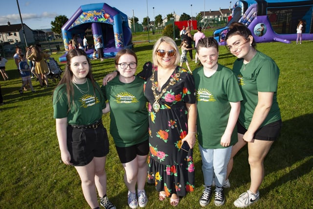 PARTY IN THE PARK!. . . . The Mayor, Sandra Duffy pictured with some of the young volunteers at Thursday's 'Party in the Park' in Shantallow. From left, Cara Donegan, Cara Leigh Doherty, Kyla Doherty and Katie Roberts-Lynch. (Photos: Jim McCafferty Photography)