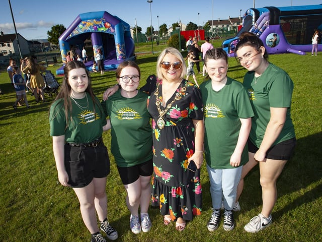 PARTY IN THE PARK!. . . . The Mayor, Sandra Duffy pictured with some of the young volunteers at Thursday's 'Party in the Park' in Shantallow. From left, Cara Donegan, Cara Leigh Doherty, Kyla Doherty and Katie Roberts-Lynch. (Photos: Jim McCafferty Photography)
