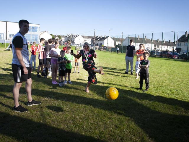 Mayor Sandra Duffy shows off her shooting skills in the Target Football during Thursday evening's 'Party in the Park' in Shantallow.