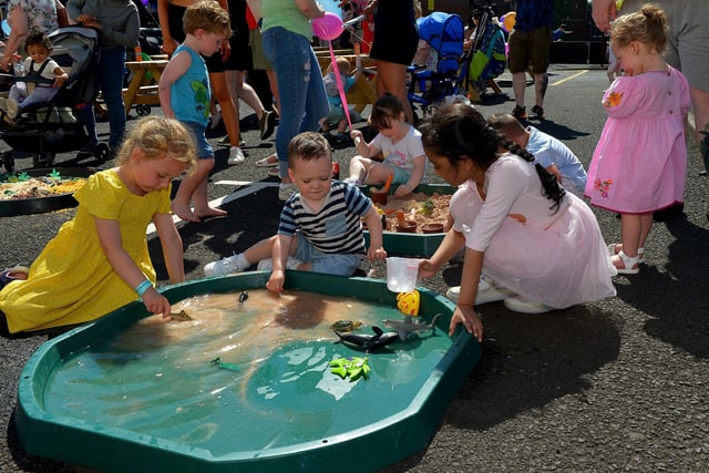 Children enjoy playing with the water pools at the Gasyard Féile’s Big Bog BBQ on Saturday afternoon last.  Photo: George Sweeney.  DER2232GS – 069
