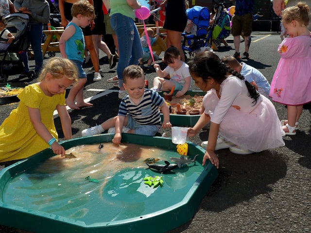 Children enjoy playing with the water pools at the Gasyard Féile’s Big Bog BBQ on Saturday afternoon last.  Photo: George Sweeney.  DER2232GS – 069