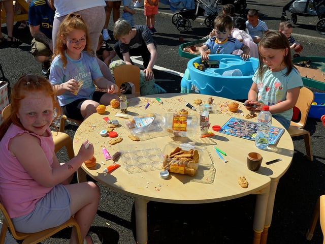 Decorating buns at the Gasyard Féile’s Big Bog BBQ on Saturday afternoon last.  Photo: George Sweeney.  DER2232GS – 071