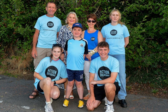 Fifteen-year-old Niall O’Doherty pictured Mayor Sandra Duffy and his family, dad Kevin, mum Deborah, Ciara, Eimear and Oran before setting off on his walk, on Saturday morning, from Bay Road to the Peace Bridge, to raise money for Action Duchenne. Photo: George Sweeney.  DER2232GS – 040