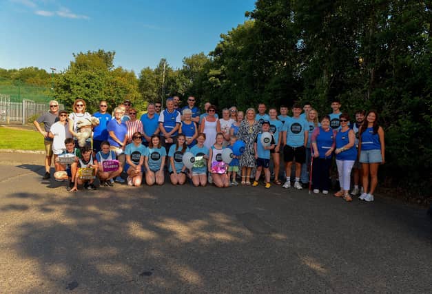 Fifteen-year-old Niall O’Doherty pictured with mayor Sandra Duffy family, extended family and supporters before setting off on his walk, on Saturday morning, from Bay Road to the Peace Bridge, to raise money for Action Duchenne Photo: George Sweeney. DER2232GS – 045