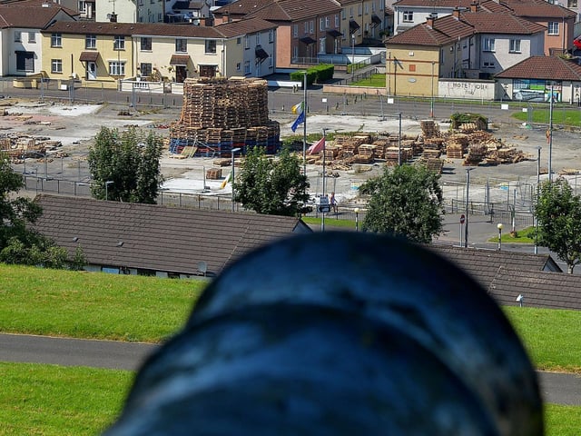 Bonfire under construction in Meenan’s Square in the Bogside..  Photo: George Sweeney.  DER2232GS – 063
