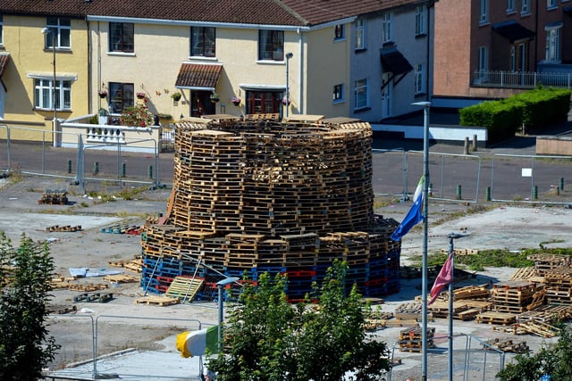 Bonfire under construction in Meenan’s Square in the Bogside..  Photo: George Sweeney.  DER2232GS – 064