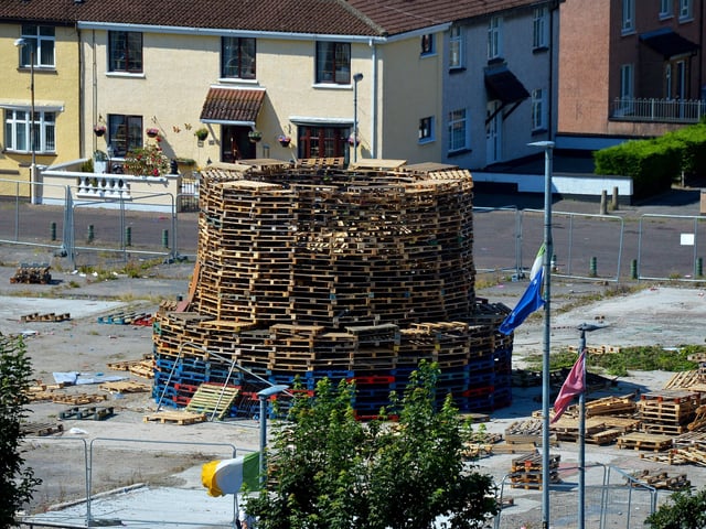 Bonfire under construction in Meenan’s Square in the Bogside..  Photo: George Sweeney.  DER2232GS – 064