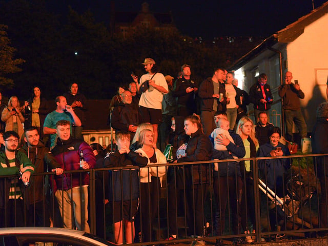 Spectators at the bonfire in Meenan’s Square on Monday night. DER2233GS – 033