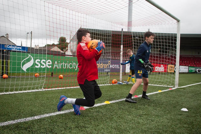 Young Caiden Saunders showing off his shot-stopping skills at Brandywell Stadium on Monday. (Photo: Jim McCafferty)