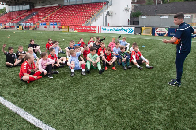 The 10+ age group pictured with soccer coach Jack Malone during the Ryan McBride Summer Soccer Academy at the Brandywell Stadium on Monday. (Photos: Jim McCafferty Photography)