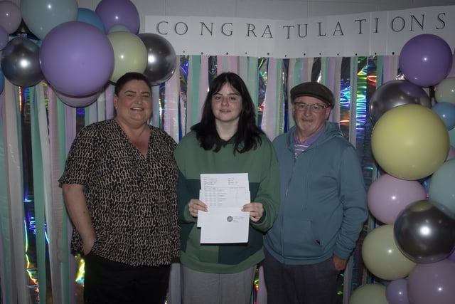St. Maryâ€TMs A Level student Annie Brown pictured with proud parents Margaret and Tony.