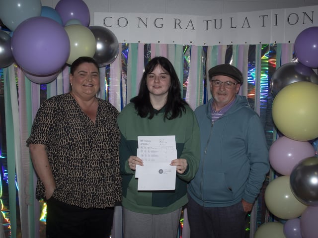 St. Maryâ€TMs A Level student Annie Brown pictured with proud parents Margaret and Tony.