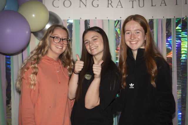 GIRLS DID WELL!. . . A Level students Abbie-Lee Miller, Louise Harkin and Emma Connolly happy with their results on Thursday at St. Maryâ€TMs College.