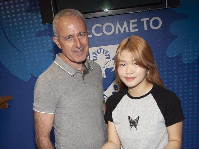 Mr. Colm Donaghy, Vice Principal, Oakgrove Integrated College congratulting Zita Cheung on her A Level results at the college on Thursday morning.