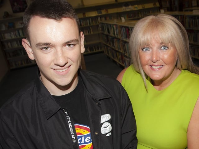 Mrs. Ciara Deane, Principal Designate, St. Josephâ€TMs Boys School congratulates Dylan Crossan on his A Level results on Thursday.