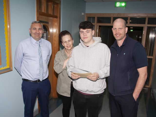 Mr. Gerry Beattie, Senior Teacher, pictured with A Level student Ben Maguire and his parents Gary and Colleen, after receiving his results on Thursday morning at St. Josephâ€TMs Boys School.
