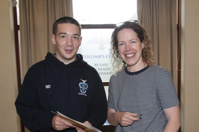 St. Columbâ€TMs College A Level student Shane Deery is congratulated by his biology teacher Mrs. Ursula Grimley yesterday.
