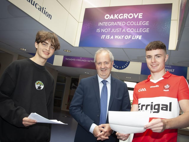 Principal Designate of Oakgrove Integrated College Mr. John Harkin pictured with students James Tomlinson and Dara Donaghey after they received their A Level results at the school on Thursday morning. (Photos: Jim McCafferty Photography)