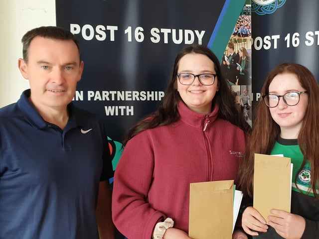 St. Patrick's College Dungiven. Delighted A Level students, Daria Tama and Keira Cartin pictured with Head of 6th Form, Mr. McMullan.