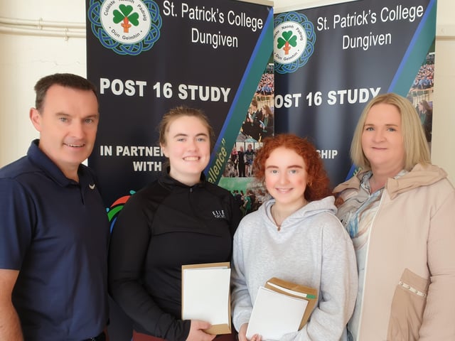St. Patrick's College Dungiven. Top achieving AS Level students Erin McClune and Nyree O'Kane pictured with Principal, Mrs. Scullion and Head of 6th Form, Mr. McMullan.