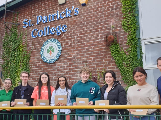 St. Patrick's College Dungiven: A Level students on results morning pictured with Principal, Mrs. Scullion and Head of 6th Form, Mr. McMullan.