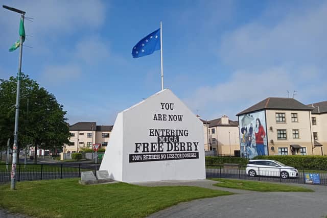 A recent solidarity message for the families affected by the MICA crisis in Donegal writ large on Free Derry Corner.