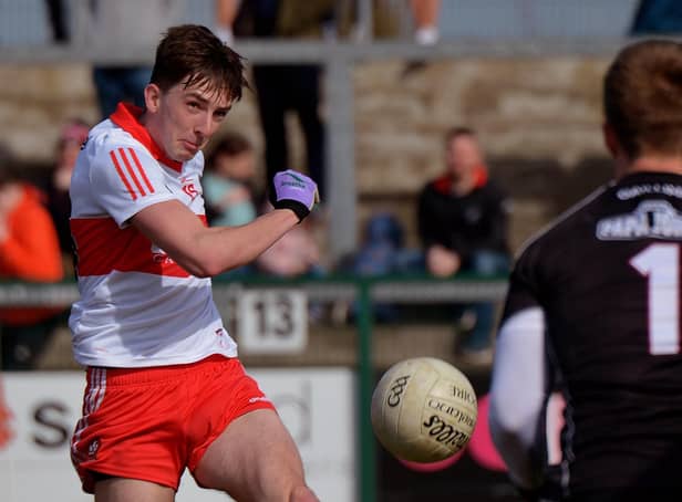 Derry players Paul Cassidy hit two late goals as Bellagy came from behind to defeat Dungiven and register the Tones' first win of the senior championship. (Photo: George Sweeney)