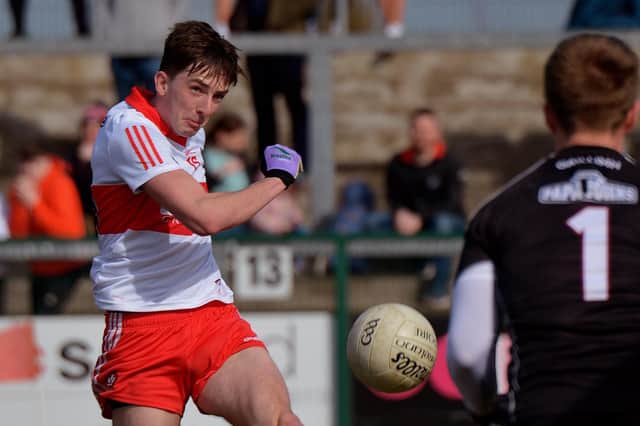 Derry players Paul Cassidy hit two late goals as Bellagy came from behind to defeat Dungiven and register the Tones' first win of the senior championship. (Photo: George Sweeney)
