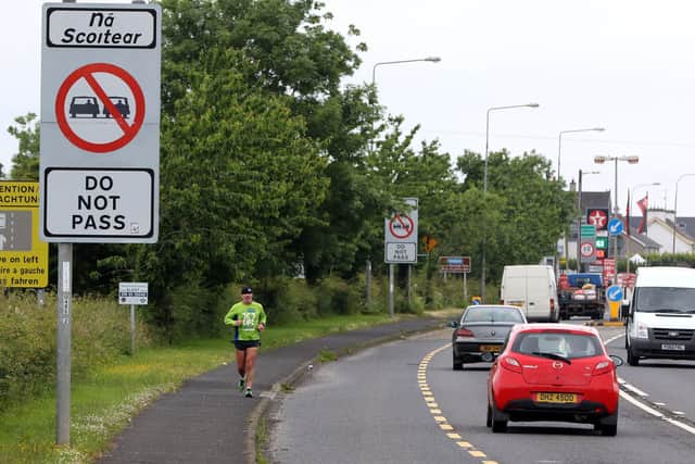 Cars cross the controless border between Northern Ireland and Ireland, in Derry in Northern Ireland, on June 25, 2016.
The result of Britain's June 23 referendum vote to leave the European Union (EU) has pitted parents against children, cities against rural areas, north against south and university graduates against those with fewer qualifications. London, Scotland and Northern Ireland voted to remain in the EU but Wales and large swathes of England, particularly former industrial hubs in the north with many disaffected workers, backed a Brexit. / AFP / PAUL FAITH        (Photo credit should read PAUL FAITH/AFP via Getty Images)