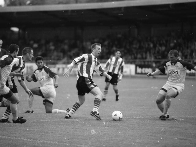 Liam Coyle glides into the Maribor penalty area.