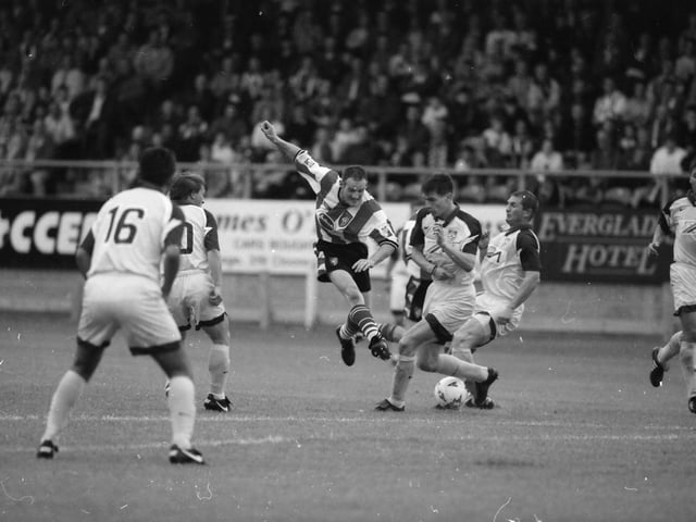 Paul Hegarty strikes on goal.