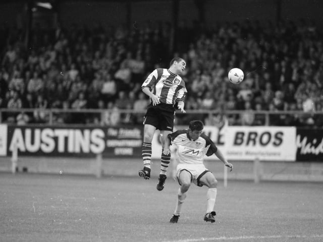 Sean Hargan rises high to win the ball.