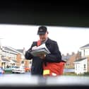 Posties are set to strike for better pay on Friday.
