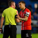 Derry City captain Patrick McEleney has a word with referee Damien MacGraith, during Friday night's game at Drogheda United.