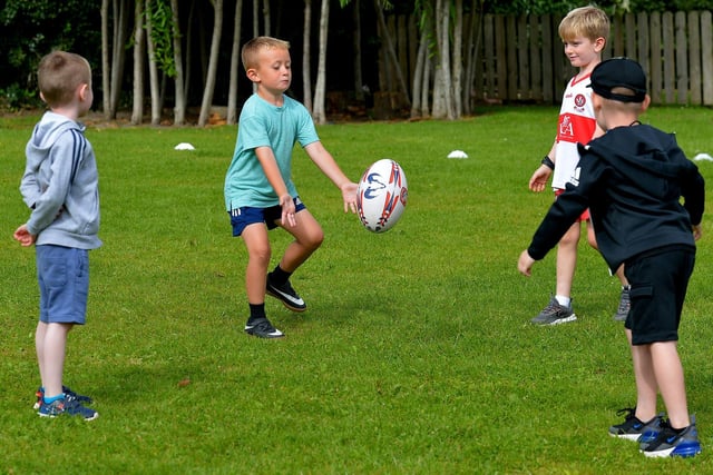 Developing rugby skills at the Eglinton Community Summer Scheme.