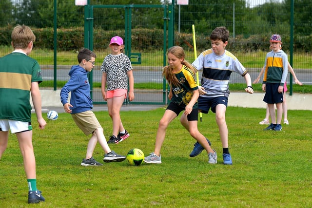 Soccer game underway at the Eglinton Community Summer Scheme, which took place at Broadbridge Primary School.