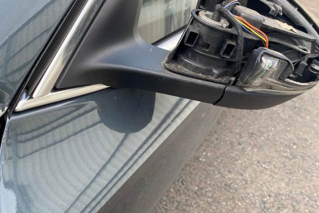 Damage was caused to both the vehicle’s wing mirrors and to its body work after stones and bricks were thrown at it by up to 10 individuals, some of whom were masked.