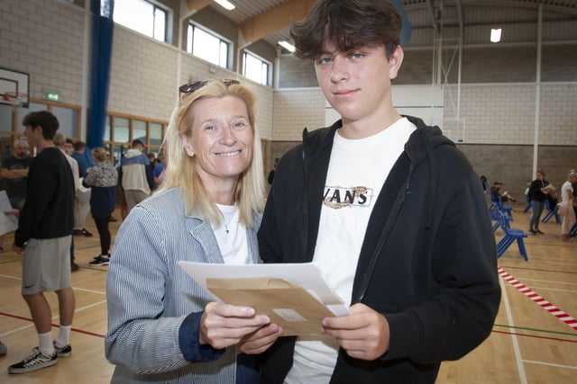 GCSE student Loughlin Ramsey-Johnston pictured with his mum Anne at St. Columbâ€TMs College on Thursday morning.