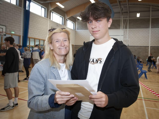 GCSE student Loughlin Ramsey-Johnston pictured with his mum Anne at St. Columbâ€TMs College on Thursday morning.