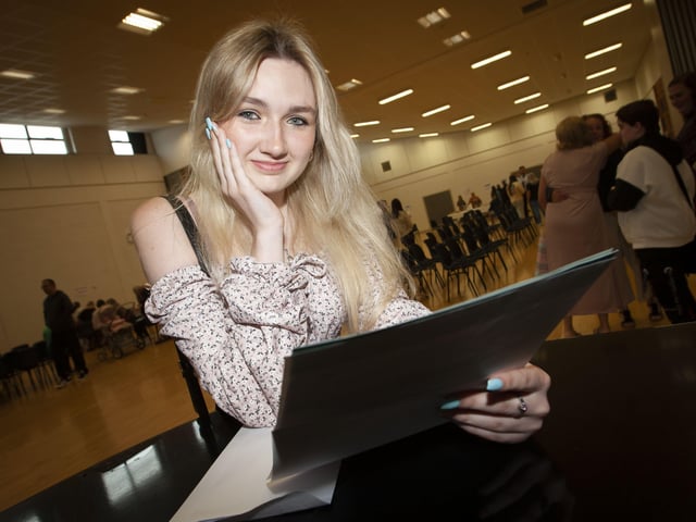 St. Maryâ€TMs College student Angel Breslin taking a moment to check her GCSE results on Thursday morning at the school. (Photos: Jim McCafferty Photography)