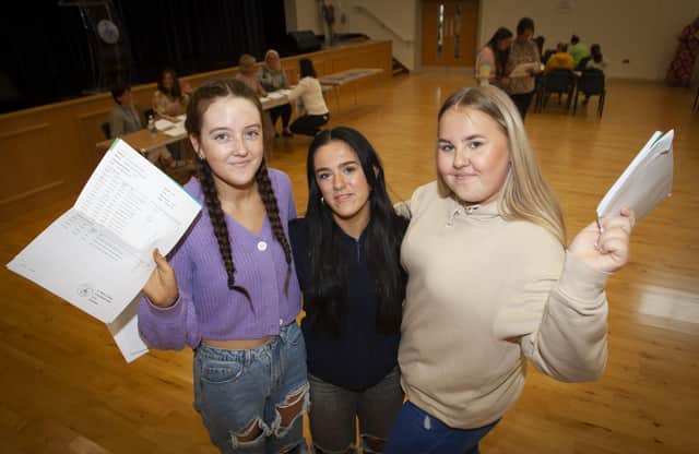 Caitlyn Gallagher Weroniica Zbytniewska and Caitlyn McGrenaghan celebrate their GCSE results at St. Mary's on Thursday.