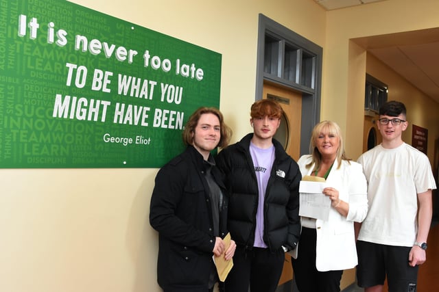 St. Josephâ€TMs Boys School Principal, Mrs. Ciara Deane pictured with GCSE students who received their results on Thursday morning. From left, Daimhin Parkhill, Gerard Meehan and Ben McGlinchey.