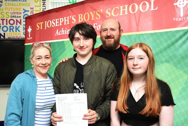 St. Josephâ€TMs Boys School GCSE student Dylan McKinney pictured with his parents Sonya and Lee and his sister Rhiannon.