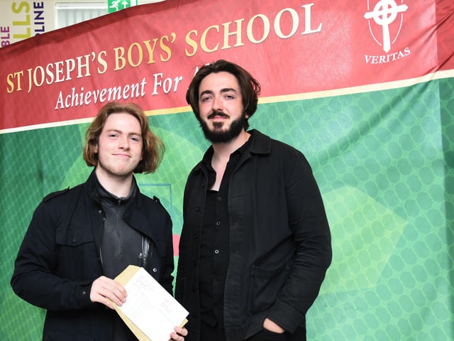 Brothers - Daimhin and Cathan Parkhill pictured at St. Josephâ€TMs Boys School on Thursday morning as Daimhin collected his GCSE results.