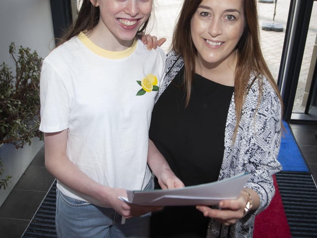 DELIGHTED MUM!. . . .St. Maryâ€TMs College student Sara Carlin pictured with her mum after getting GCSE results on Thursday morning. Sara got 2A*, 3A, 1B, 1C* and 2Cs. (Photos: Jim McCafferty Photography)