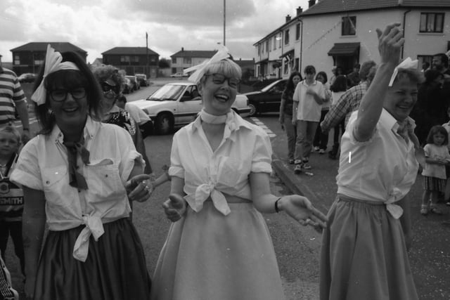 Enjoying the crack at the Creggan festival parade.