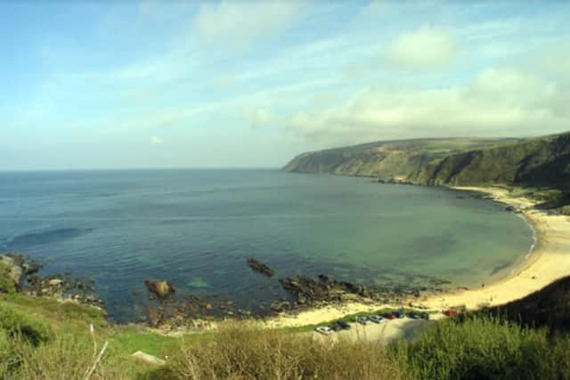 Kinnagoe Bay. The wreck of the Spanish Armada ship La Trinidad Valencera was discovered in 1971, by the City of Derry Sub Aqua Club, near the reef on the left.  (Photo by Karl Brady)