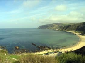 Kinnagoe Bay. The wreck of the Spanish Armada ship La Trinidad Valencera was discovered in 1971, by the City of Derry Sub Aqua Club, near the reef on the left.  (Photo by Karl Brady)