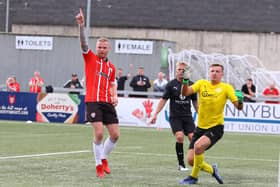 Derry City's Mark Connolly celebrates scoring against Oliver Bond Celtic.